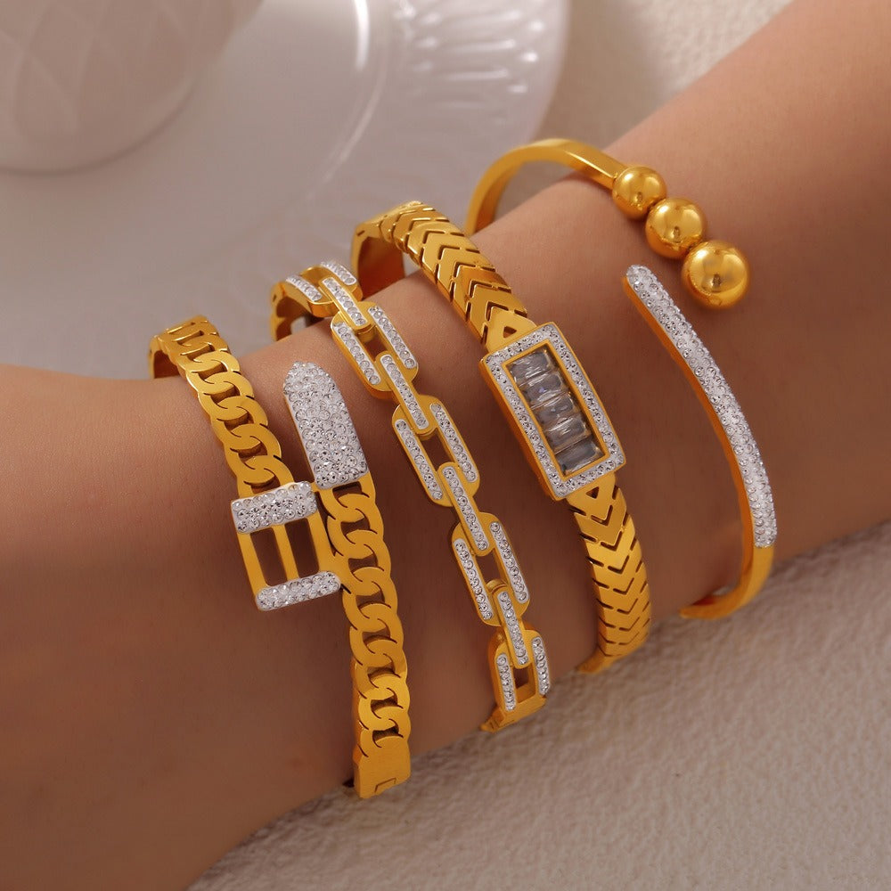 18K gold exquisite fashion inlaid gemstones and diamonds with hollow design bracelet-Luxore