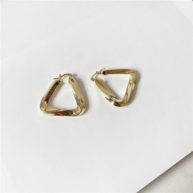 18K gold hollow triangle with irregular twisted design simple personality earrings-Luxore