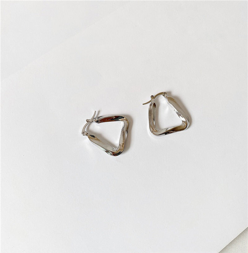 18K gold hollow triangle with irregular twisted design simple personality earrings-Luxore