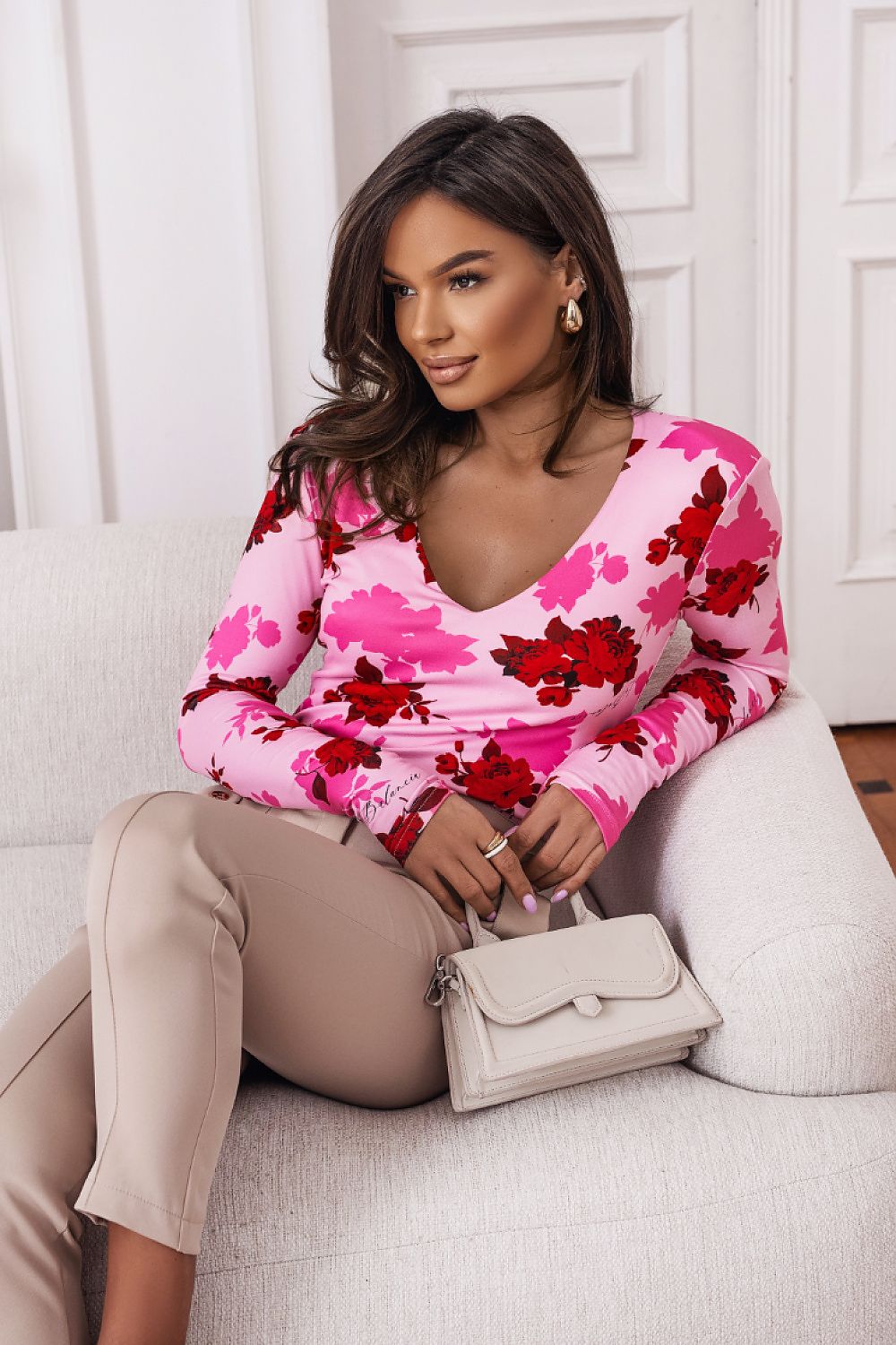 Stylish pink floral blouse from Essie, offering comfort with a lightweight feel and perfect stretch for everyday wear.