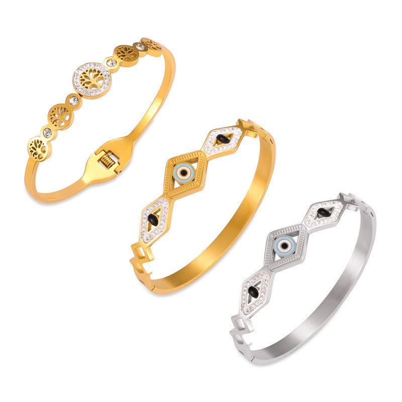 18K gold noble and fashionable devil's eye/tree of life diamond-studded design light luxury style bracelet-Luxore
