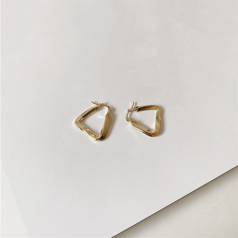 18K gold hollow triangle with irregular twisted design simple personality earrings-Luxore
