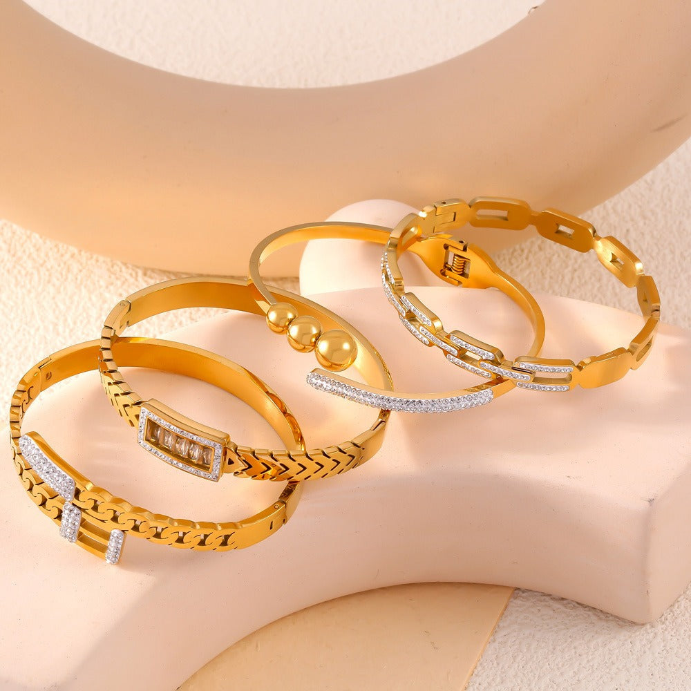 18K gold exquisite fashion inlaid gemstones and diamonds with hollow design bracelet-Luxore