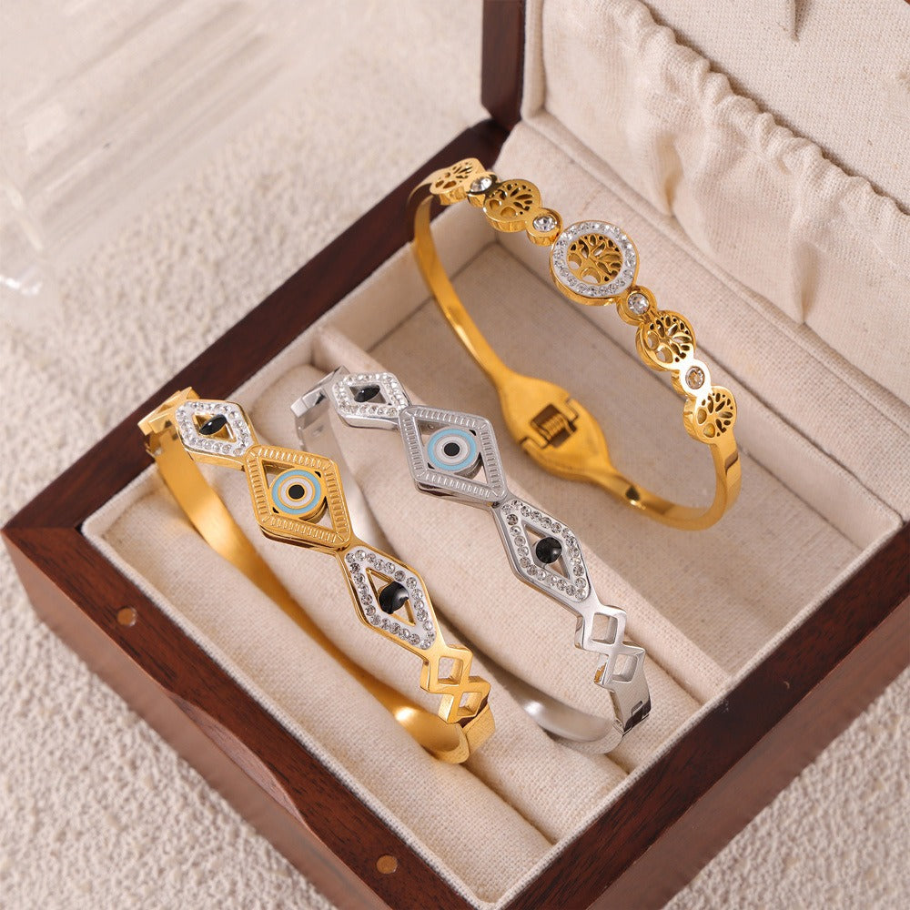 18K gold noble and fashionable devil's eye/tree of life diamond-studded design light luxury style bracelet-Luxore